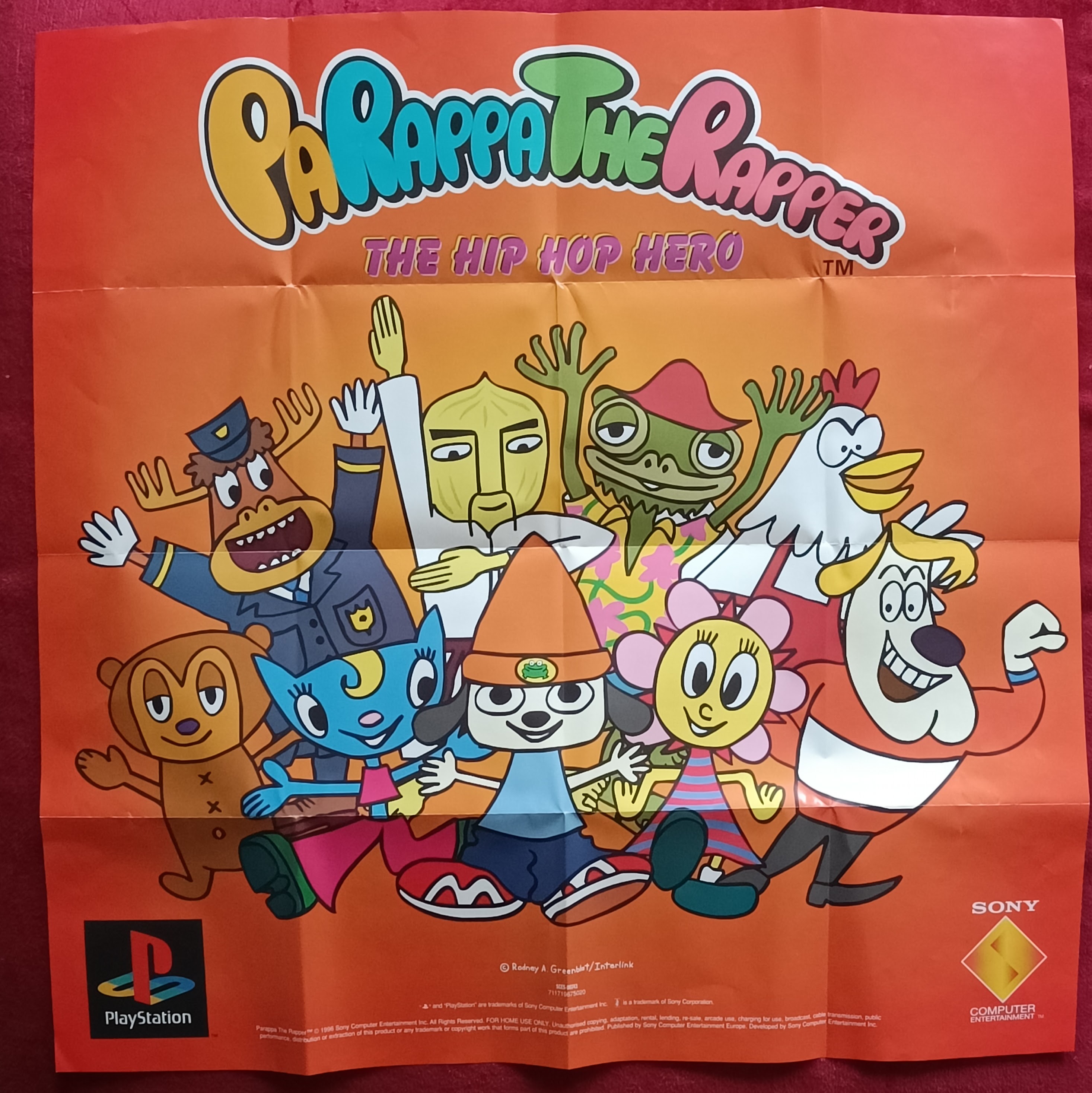 a printed poster showing, in cartoon style, all the
characters from PaRappa the Rapper